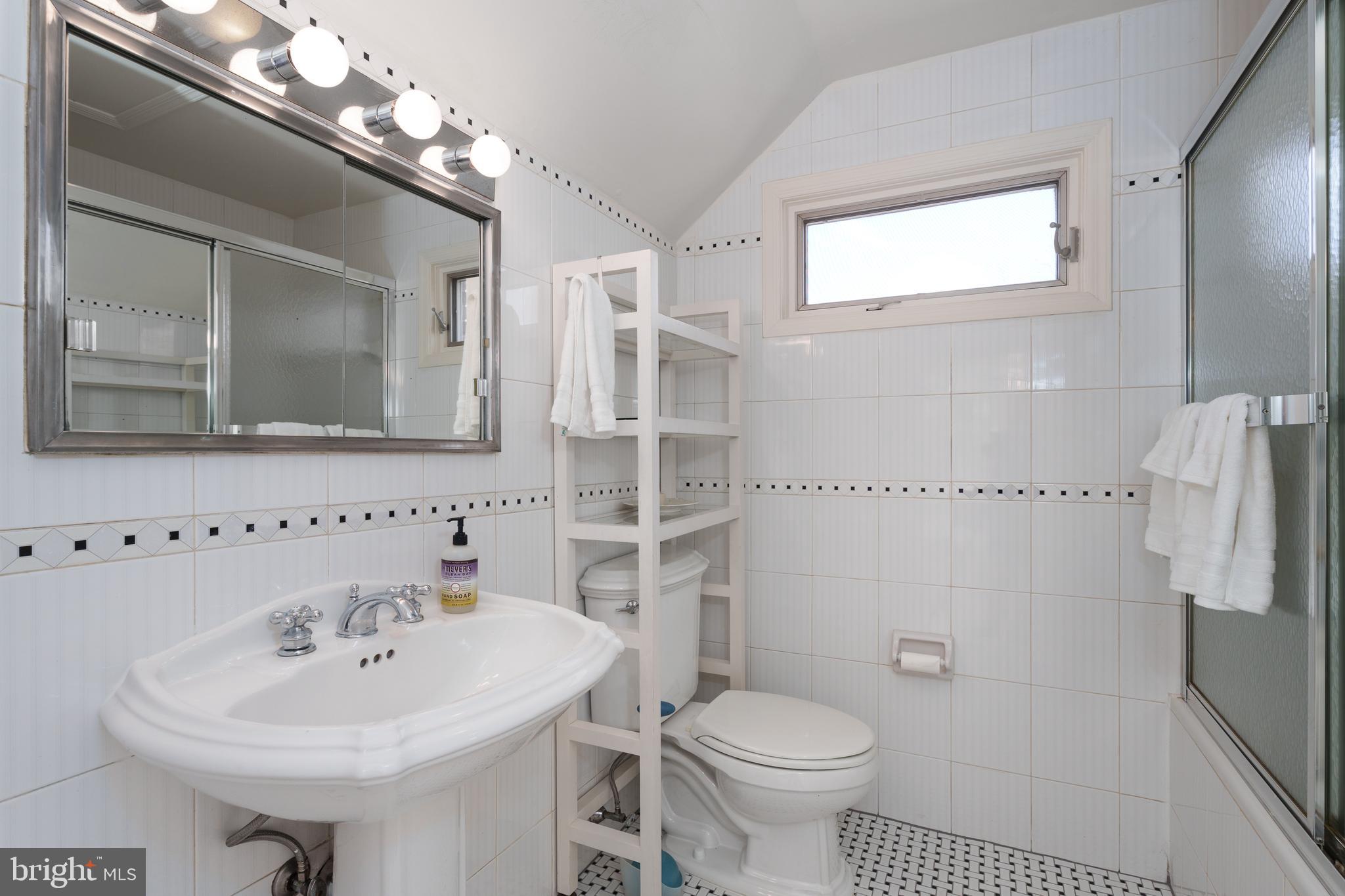 28 Talbot Lane Princeton, NJ 08540 - Photo 35 of 55 a bathroom with a sink a toilet and shower