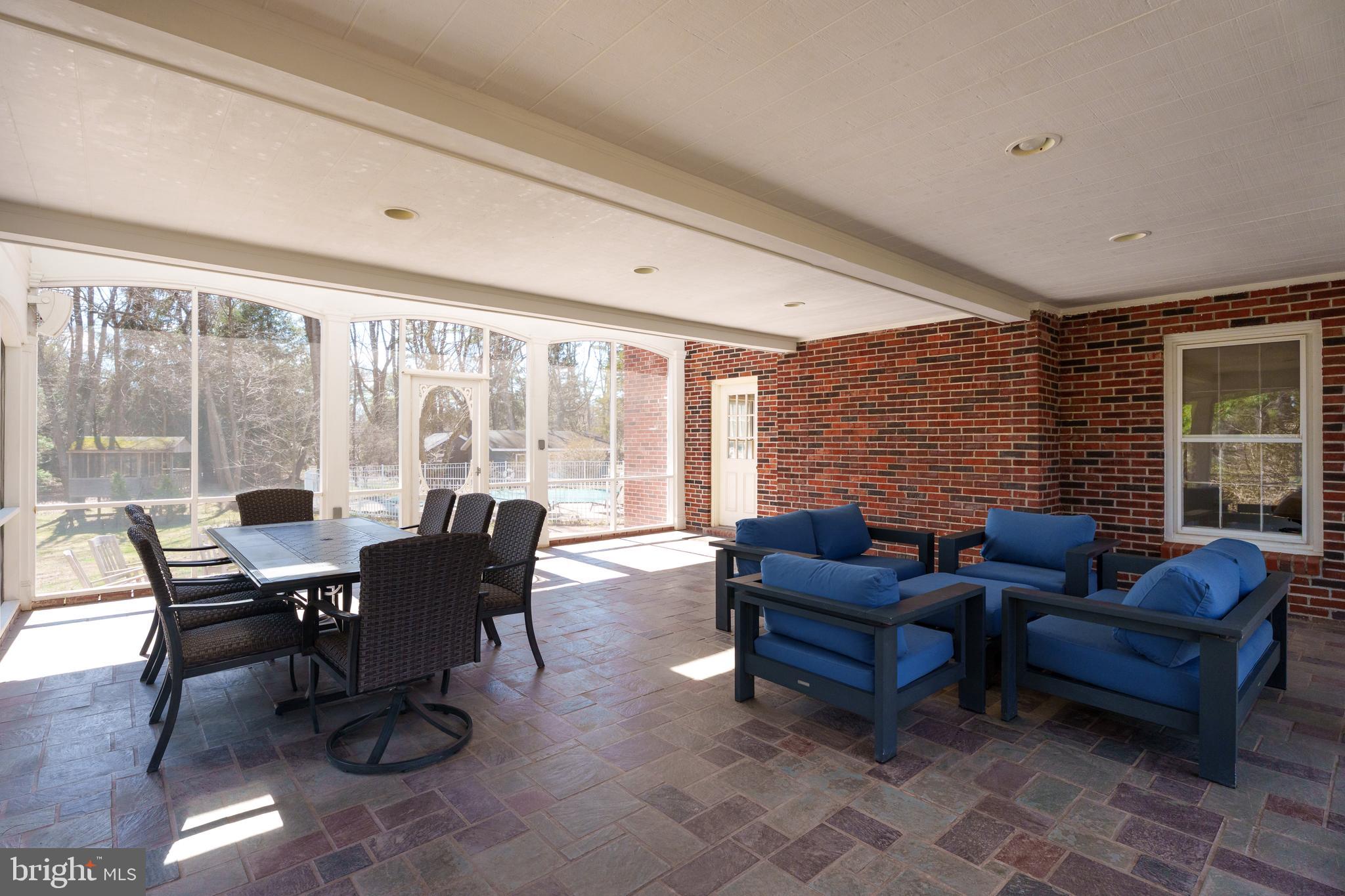 28 Talbot Lane Princeton, NJ 08540 - Photo 44 of 55 a living room with furniture and a floor to ceiling window