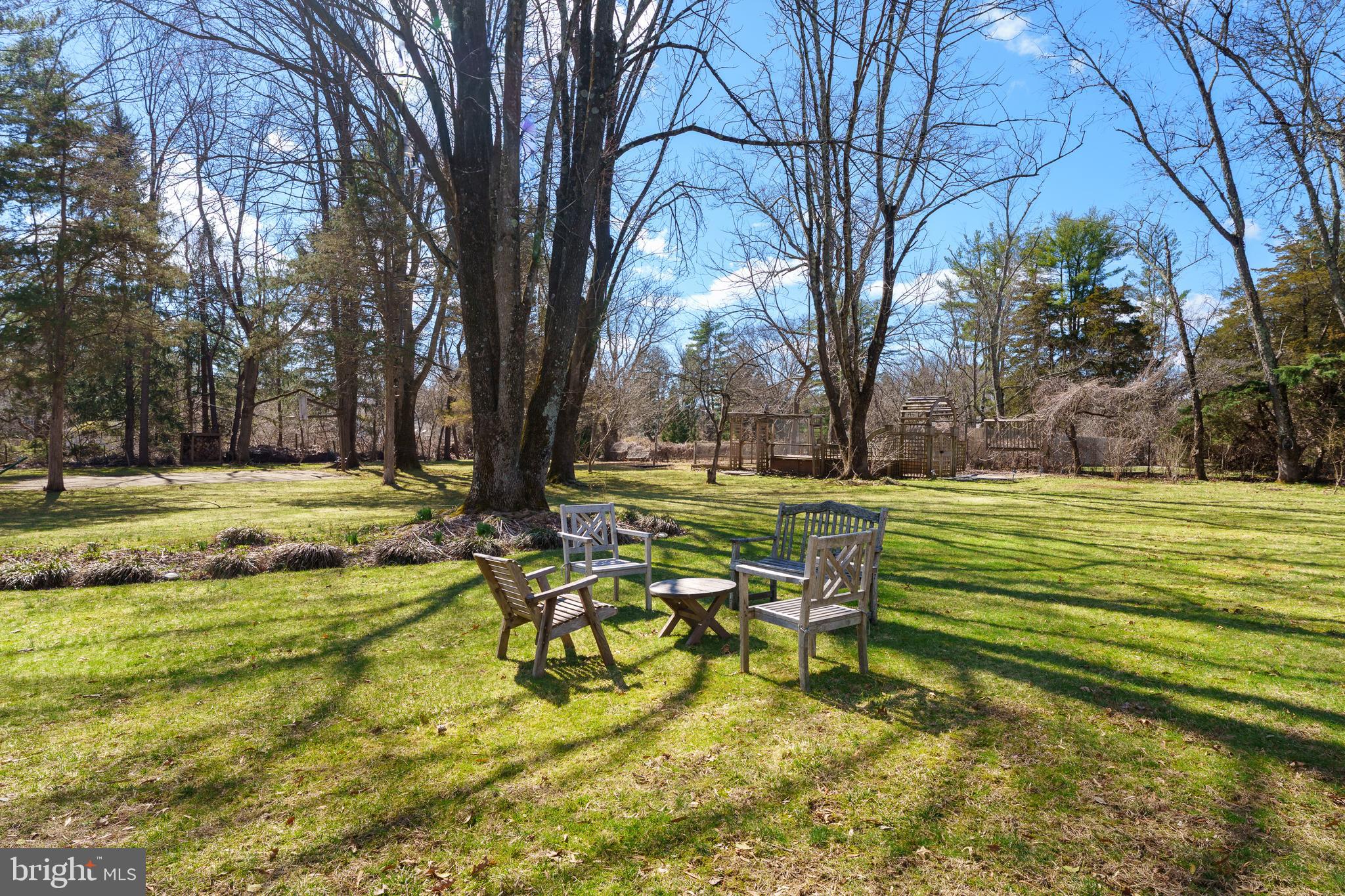 28 Talbot Lane Princeton, NJ 08540 - Photo 52 of 55 a view of swimming pool with outdoor seating and trees
