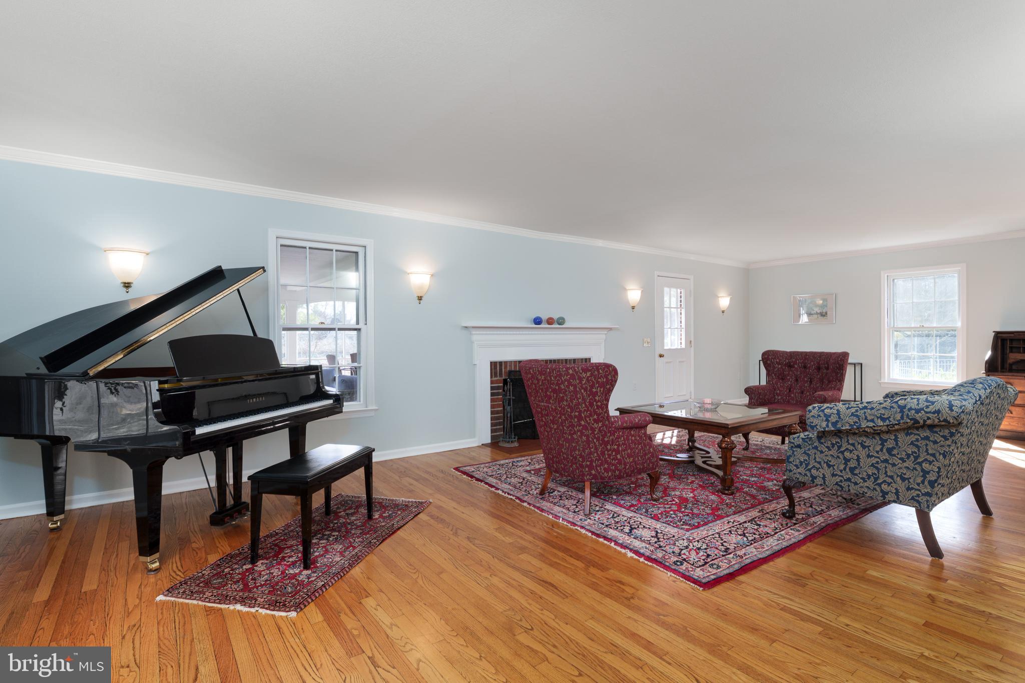 28 Talbot Lane Princeton, NJ 08540 - Photo 6 of 55 a living room with furniture a rug and a piano