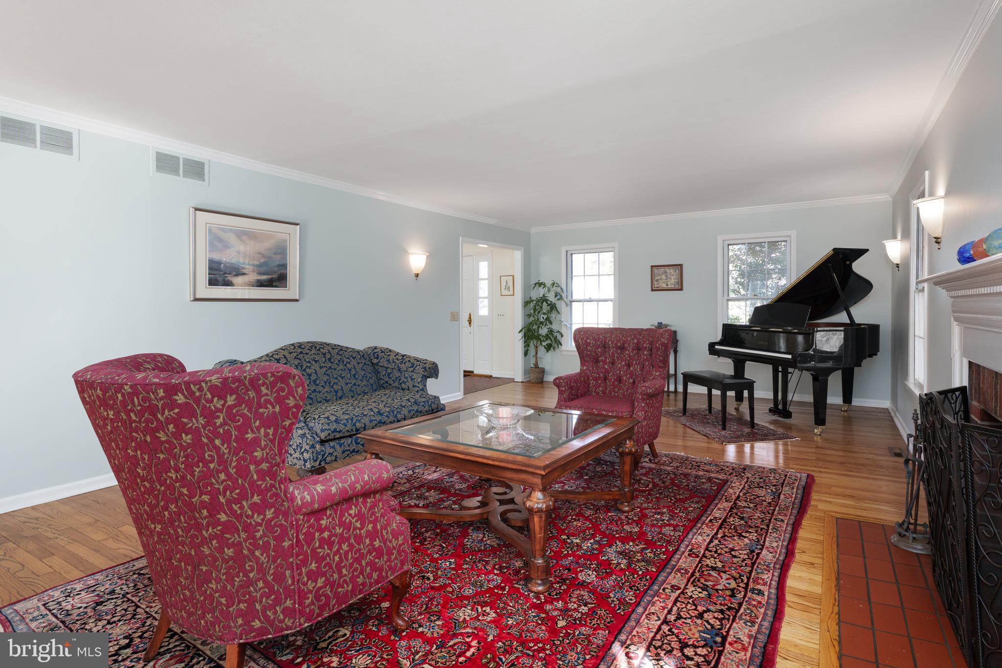 28 Talbot Lane Princeton, NJ 08540 - Photo 9 of 55 a living room with furniture a piano and a rug