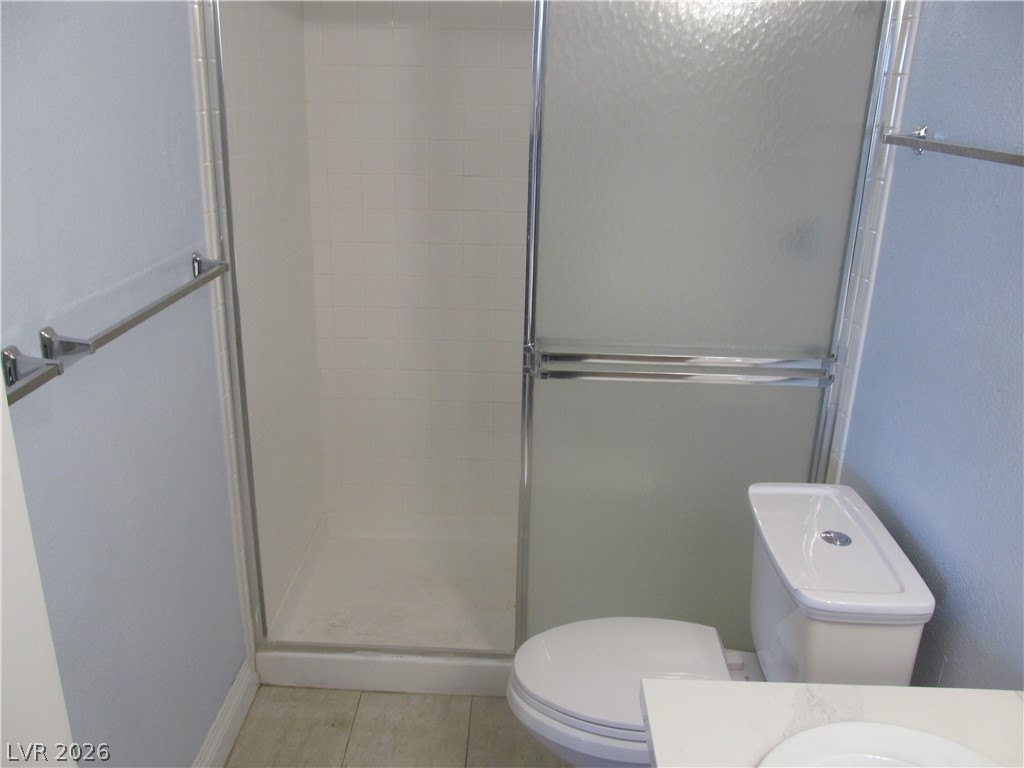 7950 West Flamingo Road, Unit 2048 Las Vegas, NV 89147 - Photo 19 of 24 A well-maintained bathroom with a spacious walk-in shower and modern fixtures.