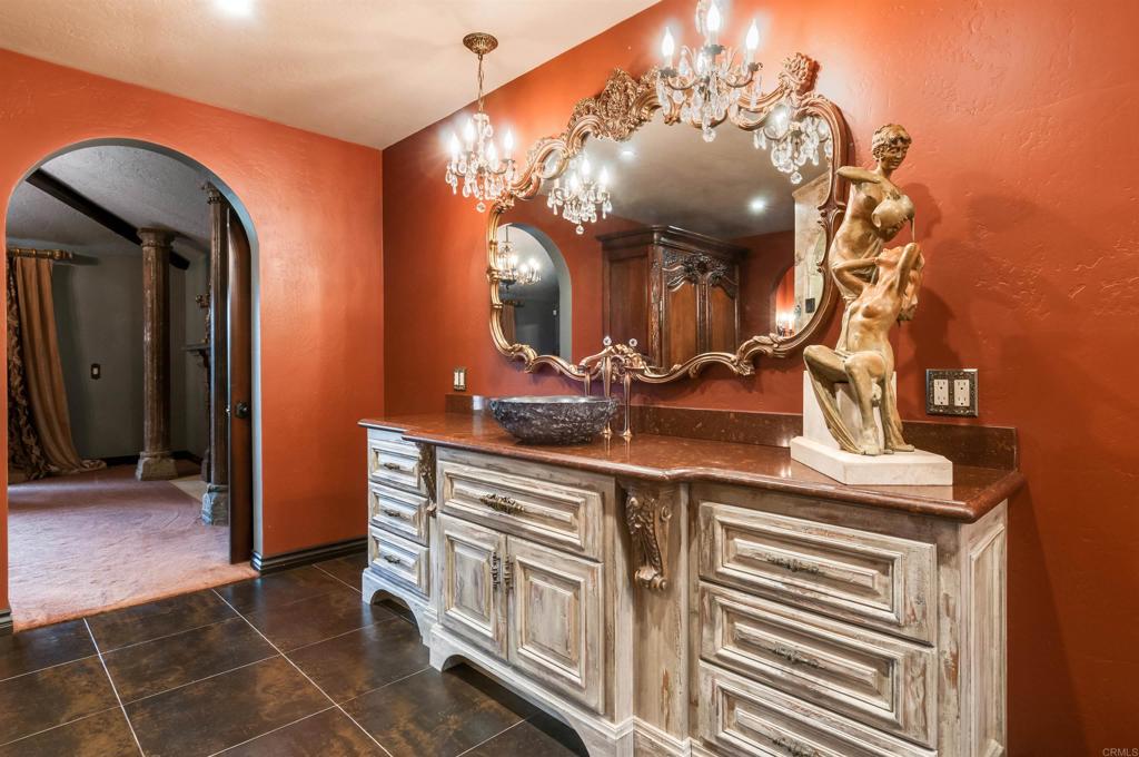 725 Hamilton Lane Fallbrook, CA 92028 - Photo 20 of 54 a bathroom with a sink and a mirror