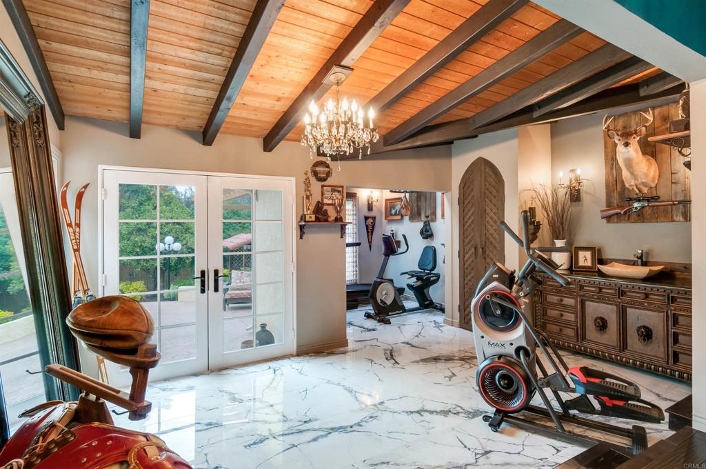 725 Hamilton Lane Fallbrook, CA 92028 - Photo 22 of 54 a view of a room with gym equipment