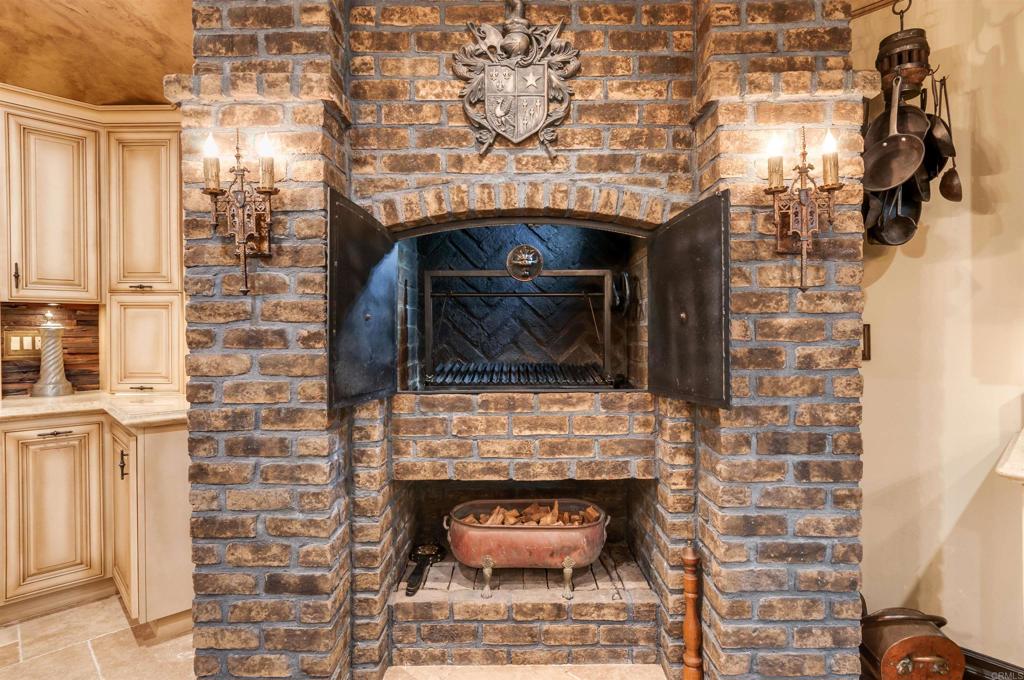 725 Hamilton Lane Fallbrook, CA 92028 - Photo 29 of 54 a living room with a fireplace