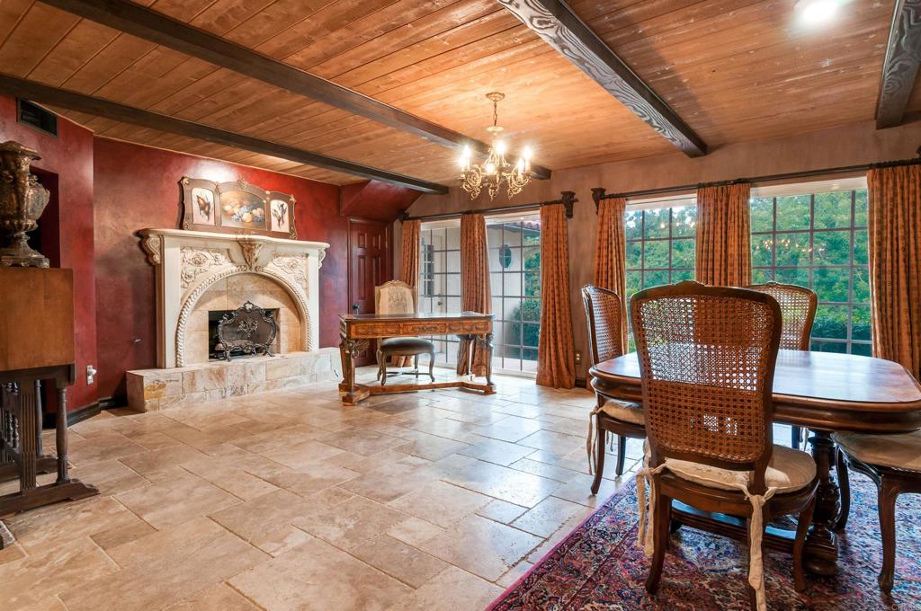 725 Hamilton Lane Fallbrook, CA 92028 - Photo 31 of 54 a living room with furniture and a fireplace