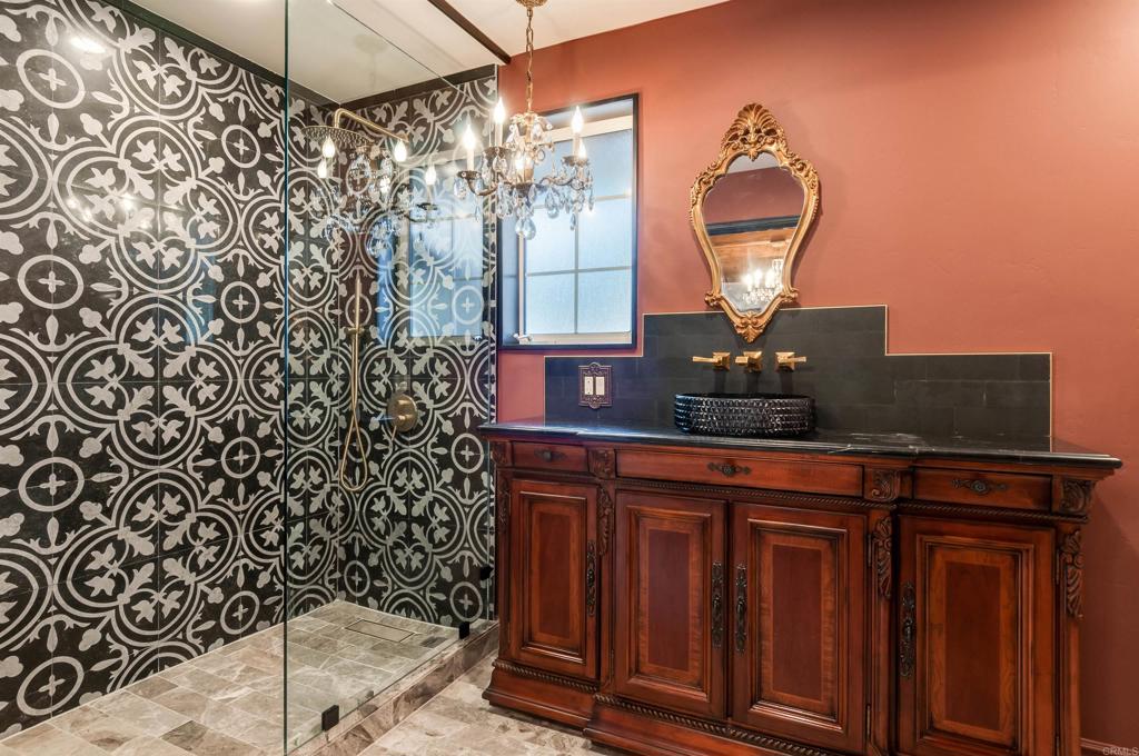 725 Hamilton Lane Fallbrook, CA 92028 - Photo 34 of 54 a bathroom with a sink and a mirror