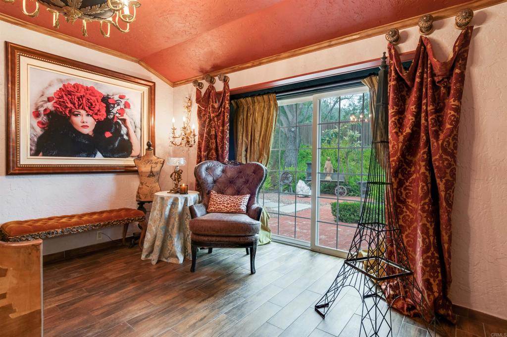 725 Hamilton Lane Fallbrook, CA 92028 - Photo 35 of 54 a living room with furniture a rug and a large window