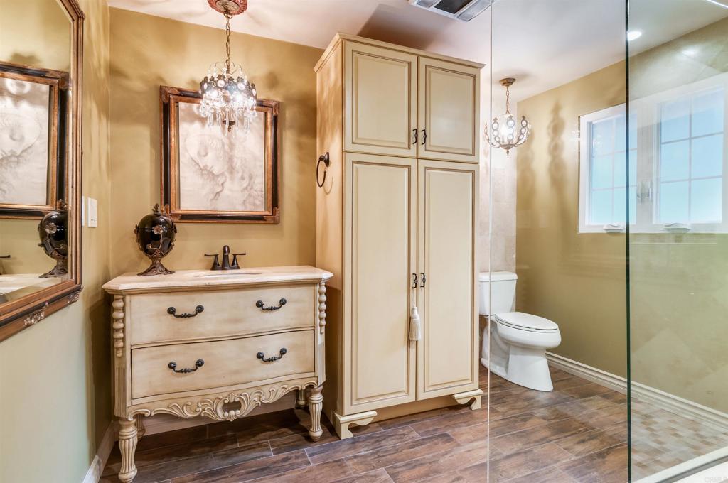 725 Hamilton Lane Fallbrook, CA 92028 - Photo 37 of 54 a bathroom with a toilet sink and shower