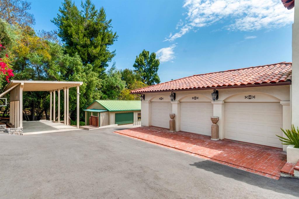 725 Hamilton Lane Fallbrook, CA 92028 - Photo 4 of 54 a view of a house with a garage