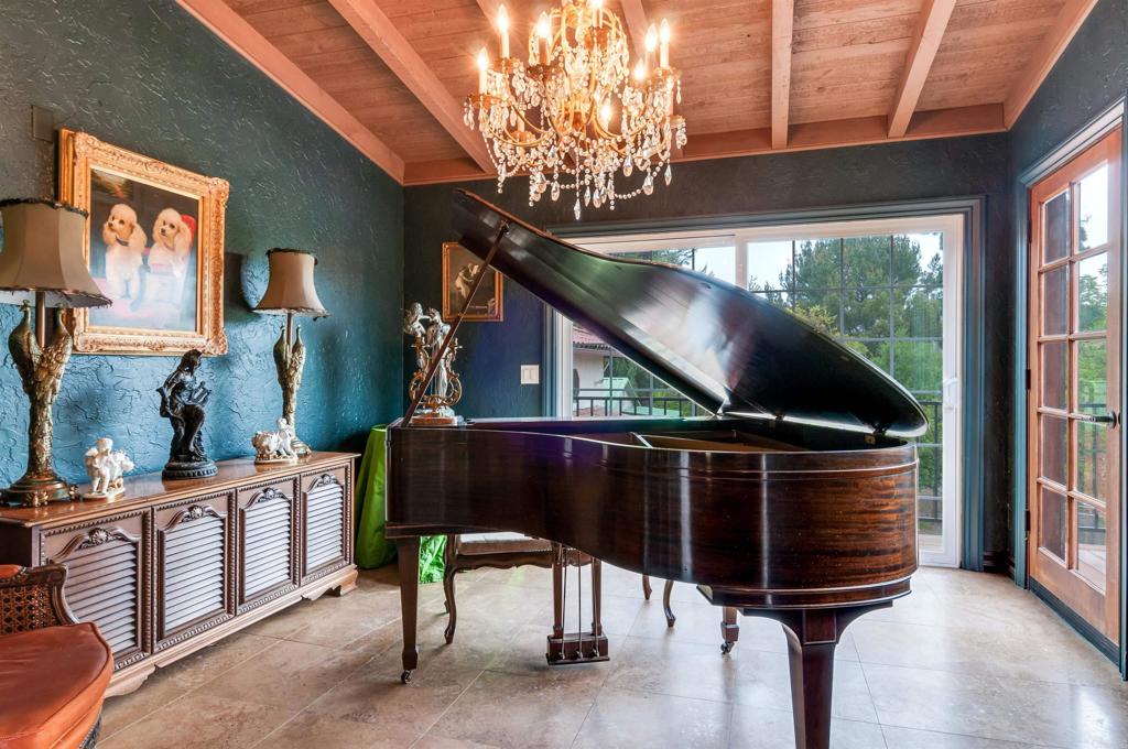 725 Hamilton Lane Fallbrook, CA 92028 - Photo 43 of 54 a living room with furniture and a fireplace