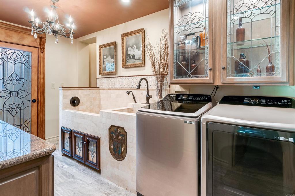 725 Hamilton Lane Fallbrook, CA 92028 - Photo 45 of 54 a utility room with dryer and washer