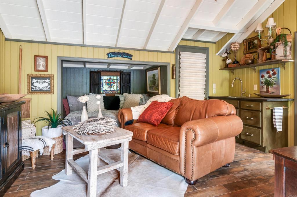 725 Hamilton Lane Fallbrook, CA 92028 - Photo 50 of 54 a living room with furniture and a fireplace
