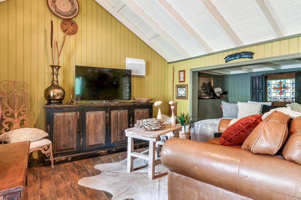 725 Hamilton Lane Fallbrook, CA 92028 - Photo 51 of 54 a living room with furniture and a flat screen tv