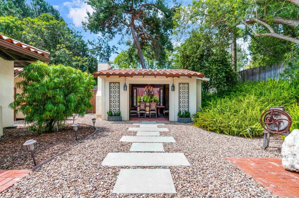 725 Hamilton Lane Fallbrook, CA 92028 - Photo 8 of 54 a view of a house with garden and plants