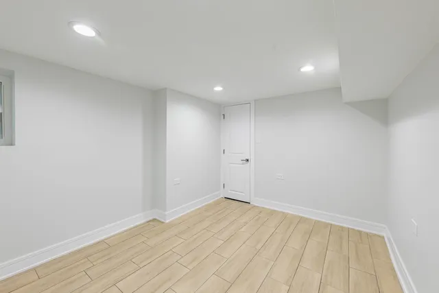 wooden floor in a hall with a carpet