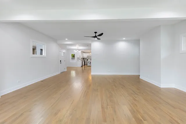 a view of a livingroom with wooden floor