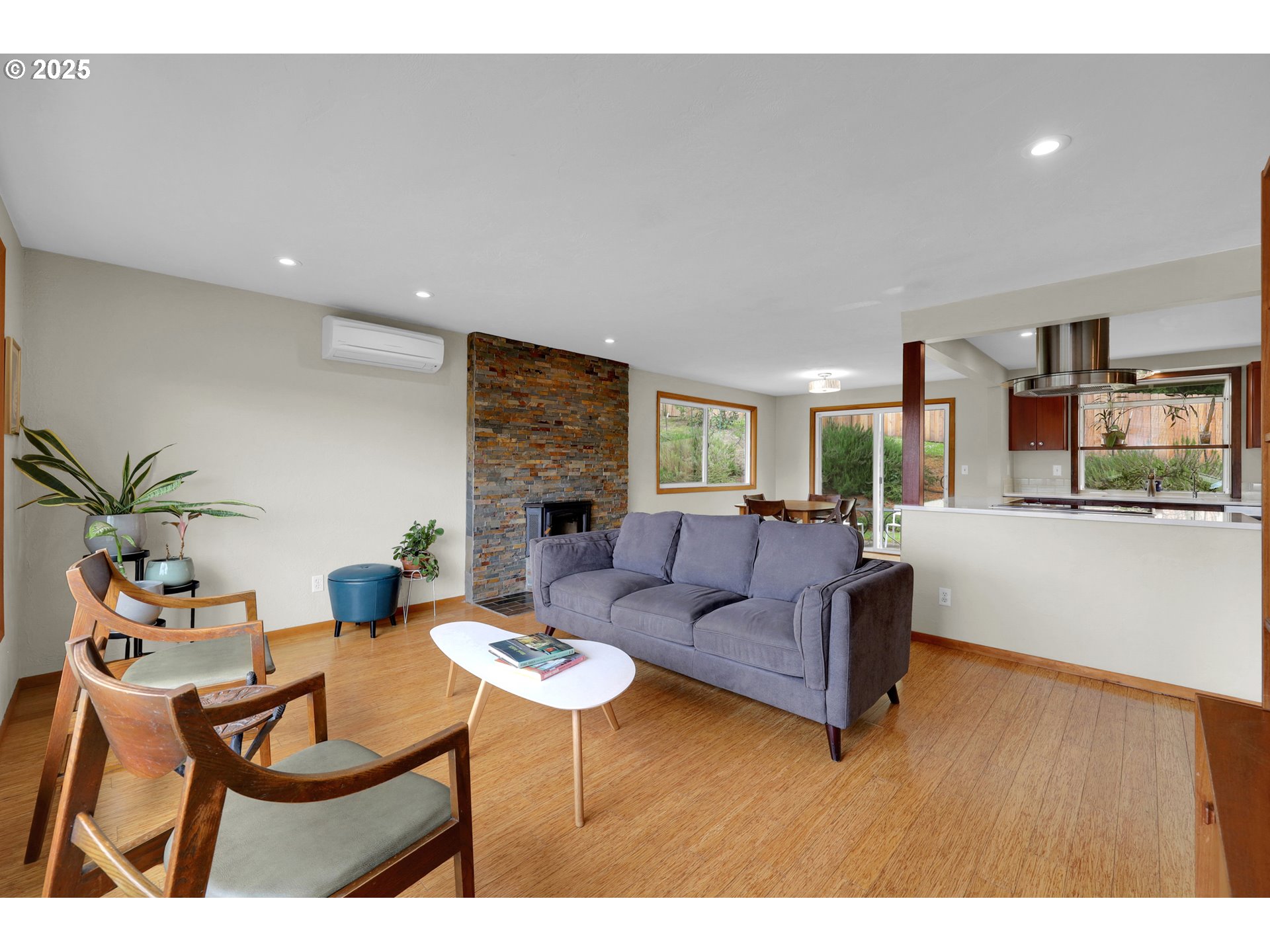 3765 Potter Street Eugene, OR 97405 - Photo 12 of 48 a living room with furniture and a wooden floor