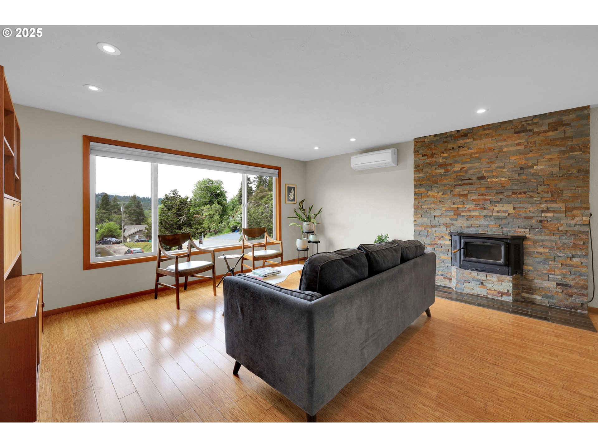 3765 Potter Street Eugene, OR 97405 - Photo 13 of 48 a living room with furniture and a fireplace