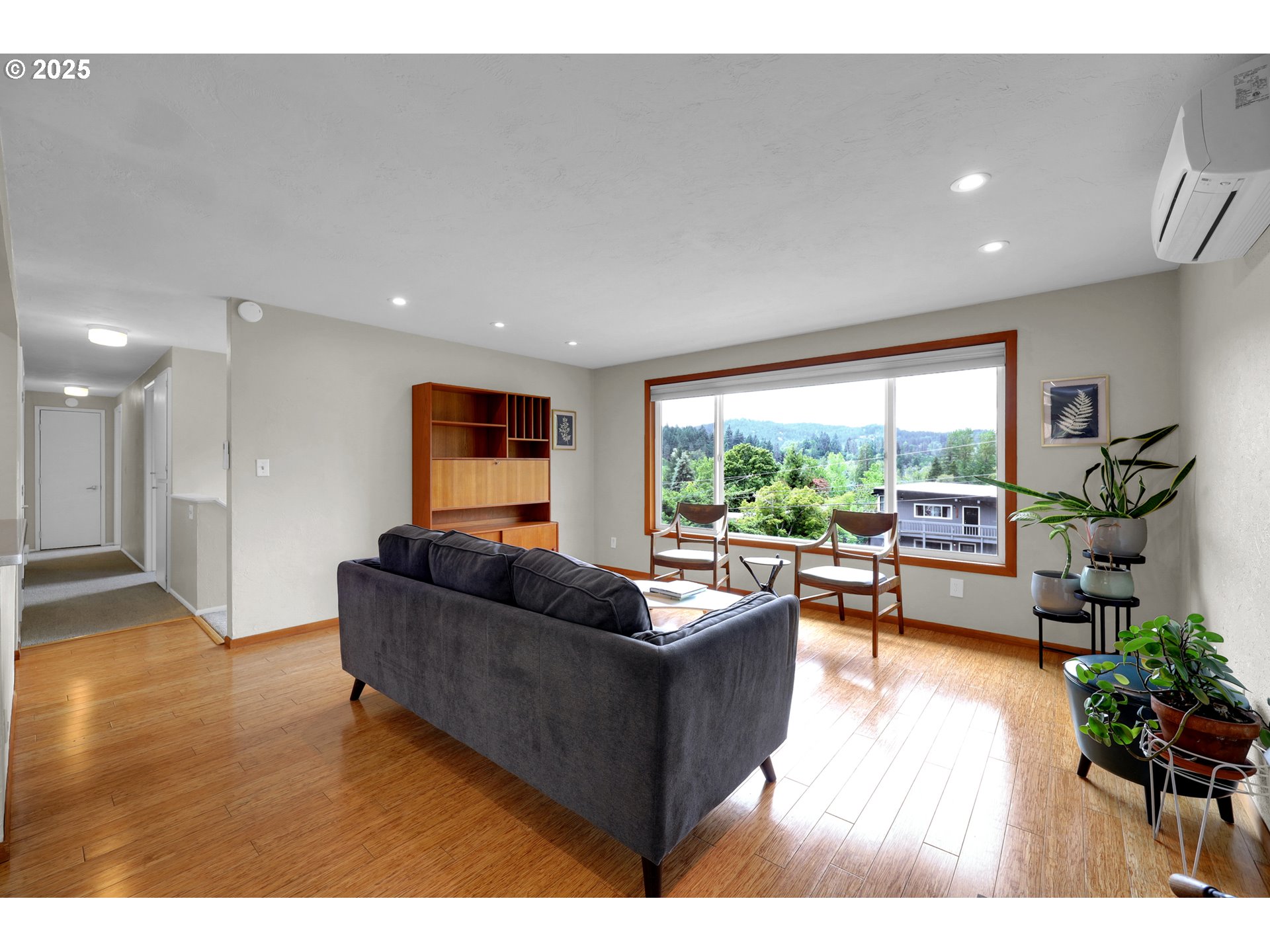 3765 Potter Street Eugene, OR 97405 - Photo 14 of 48 a living room with furniture and a large window