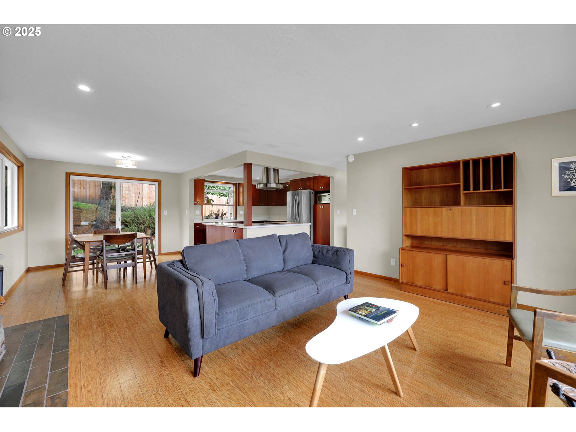 3765 Potter Street Eugene, OR 97405 - Photo 16 of 48 a living room with furniture and a wooden floor