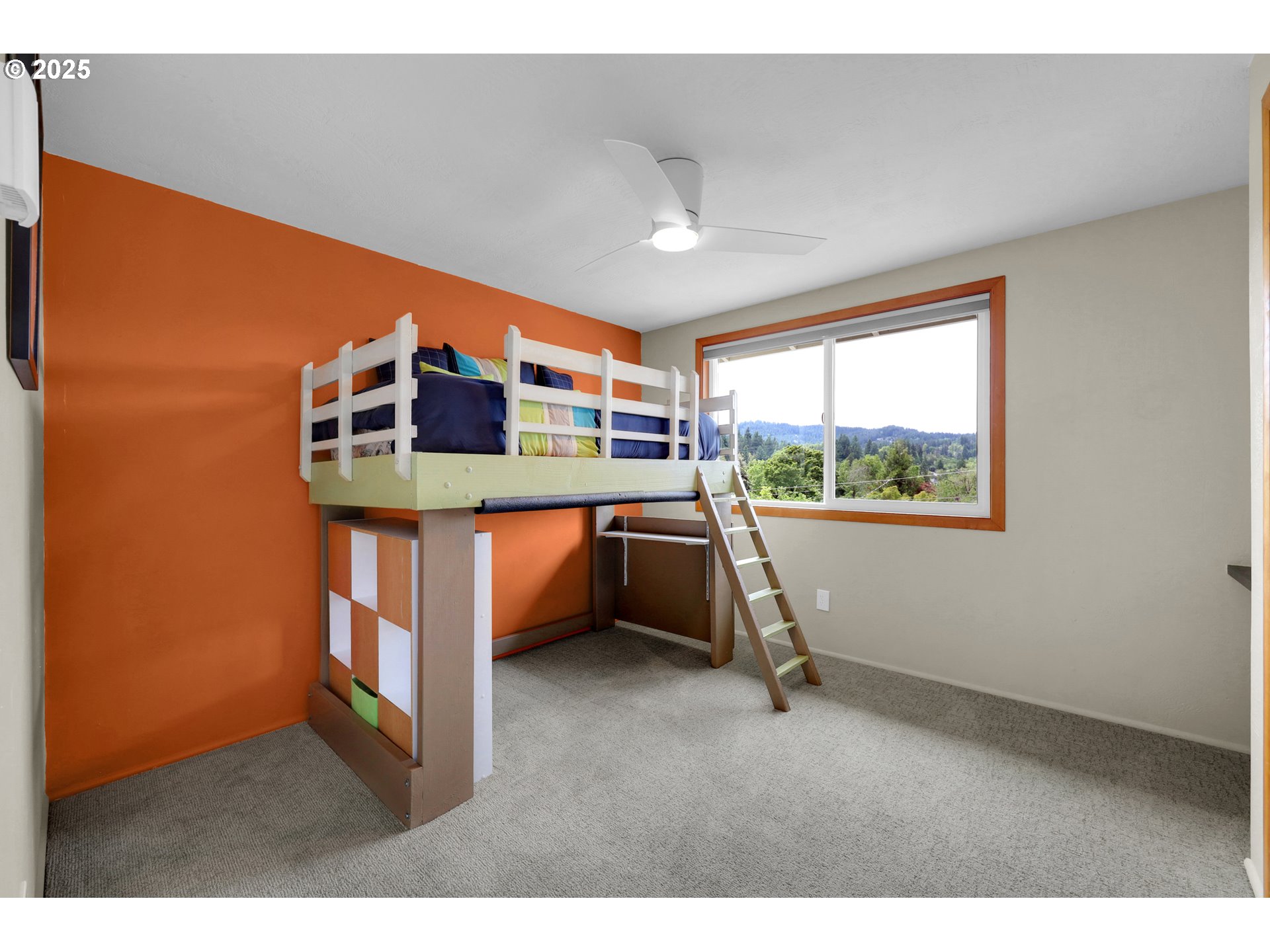 3765 Potter Street Eugene, OR 97405 - Photo 19 of 48 a view of a room with a large window and wooden floor