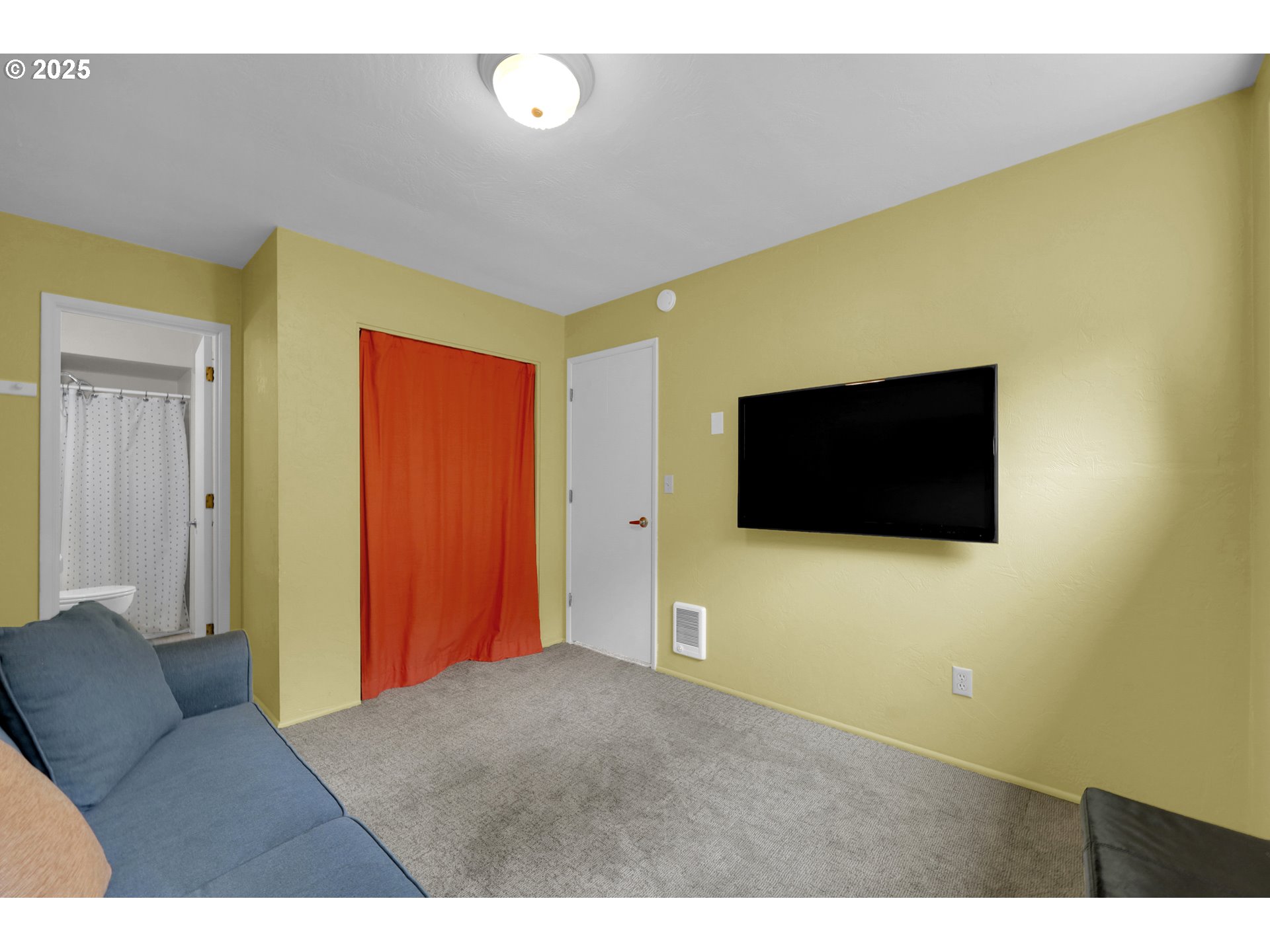 3765 Potter Street Eugene, OR 97405 - Photo 33 of 48 a living room with a flat screen tv