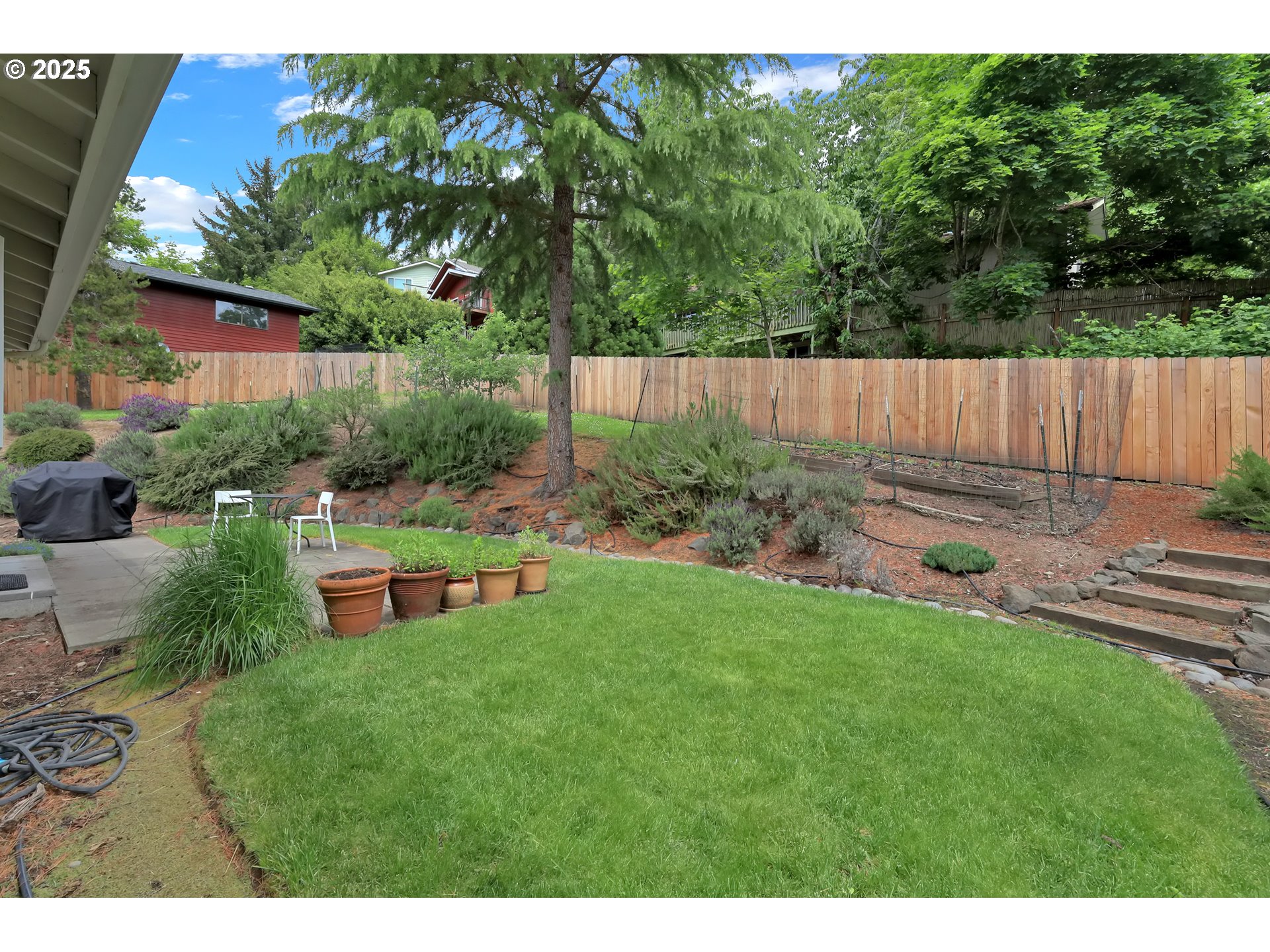 3765 Potter Street Eugene, OR 97405 - Photo 38 of 48 a garden view with a seating space
