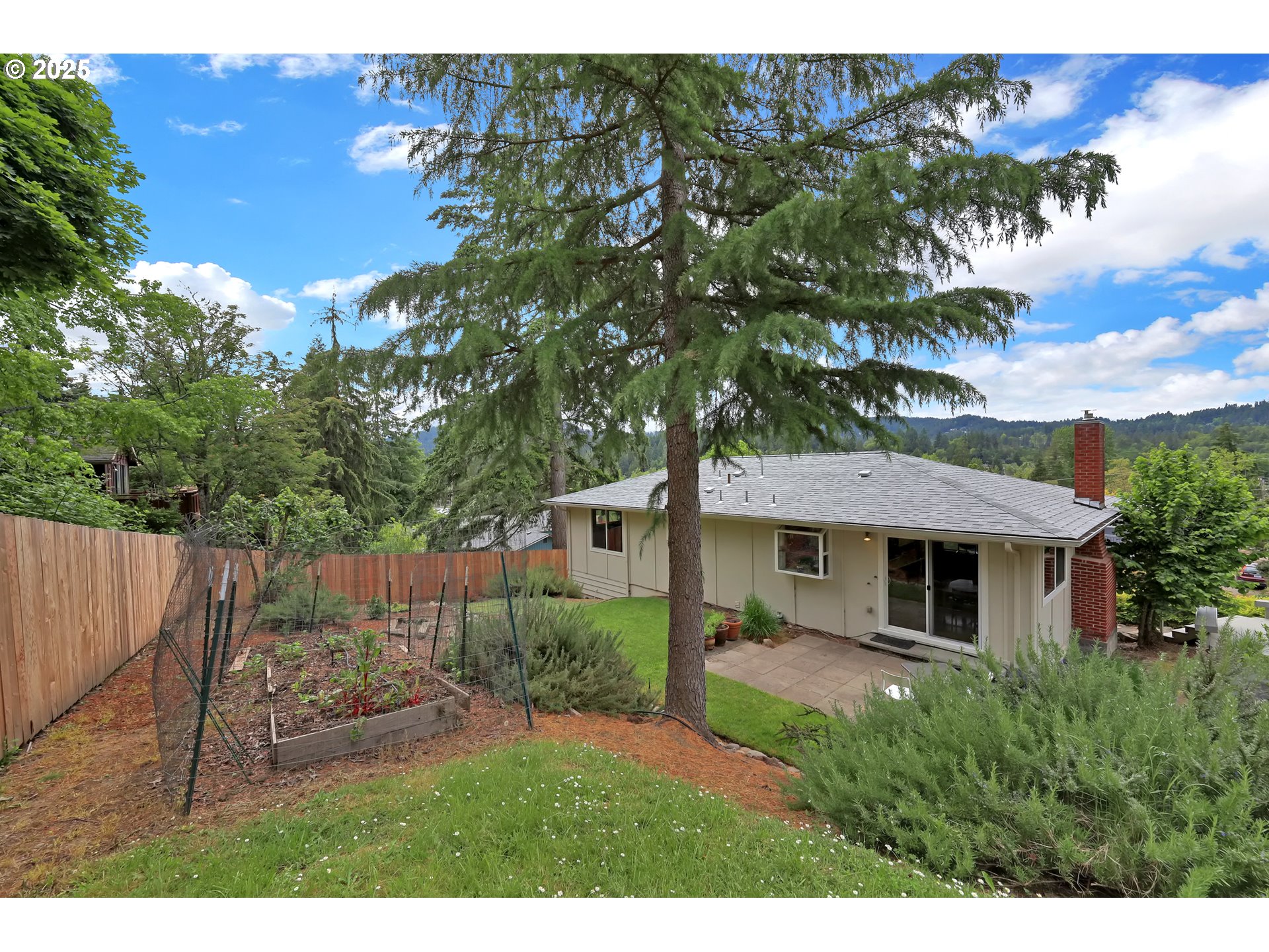 3765 Potter Street Eugene, OR 97405 - Photo 39 of 48 a view of a house with a yard