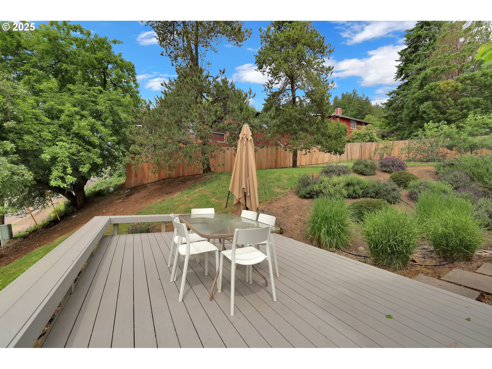 3765 Potter Street Eugene, OR 97405 - Photo 43 of 48 a balcony with wooden floor table and chairs