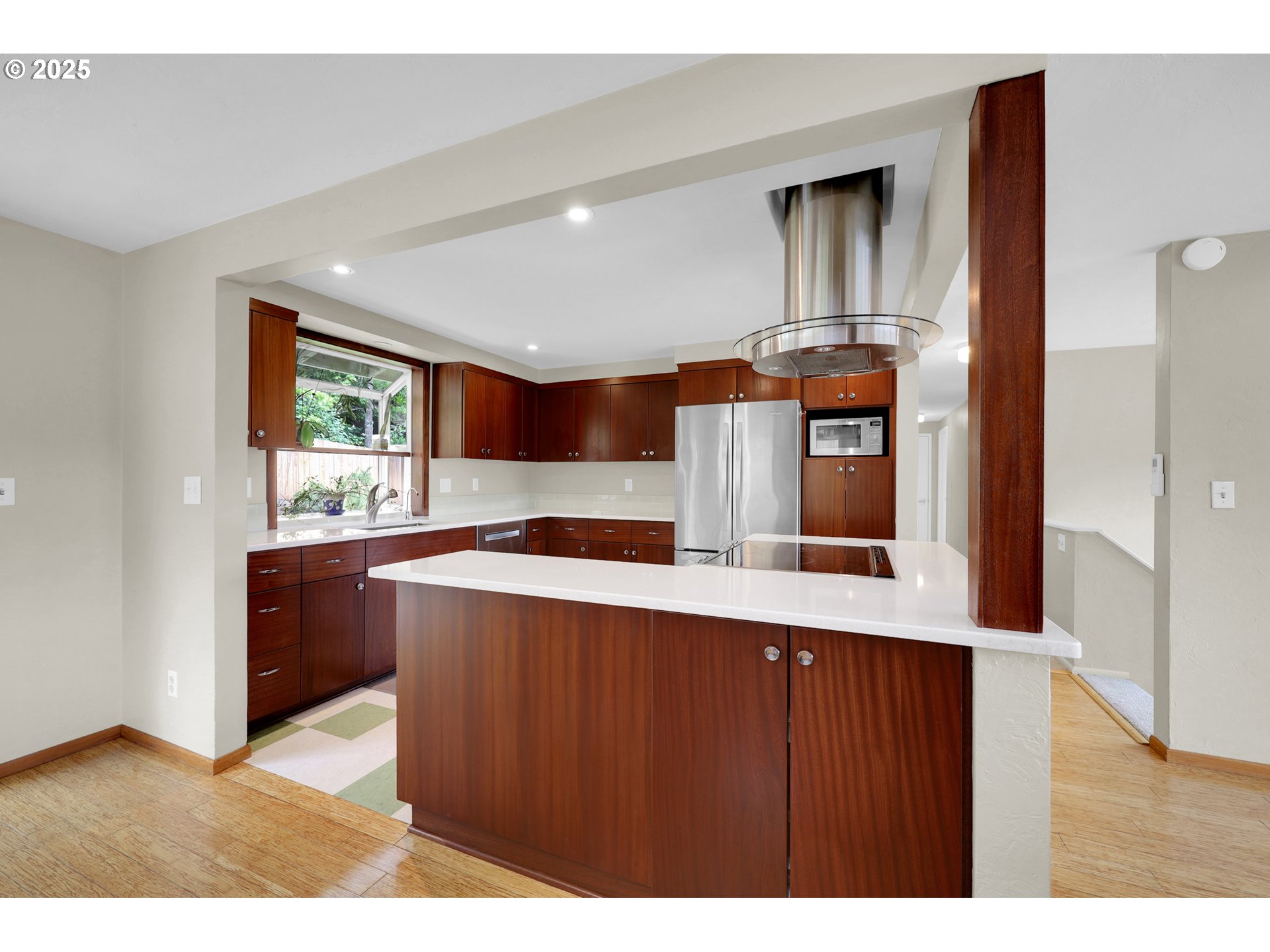 3765 Potter Street Eugene, OR 97405 - Photo 6 of 48 a kitchen with stainless steel appliances granite countertop a sink and a stove