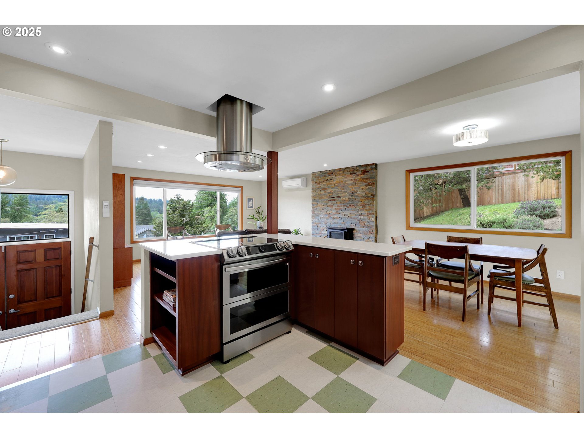 3765 Potter Street Eugene, OR 97405 - Photo 10 of 48 a kitchen with stainless steel appliances granite countertop a stove and a dining table