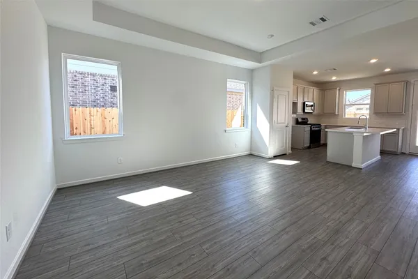 a view of an empty room and window