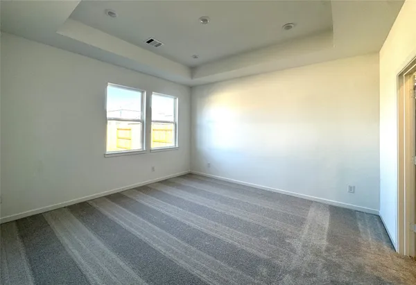 a view of an empty room and window