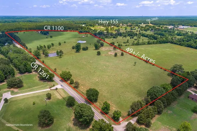 a view of a swimming pool and an outdoor seating