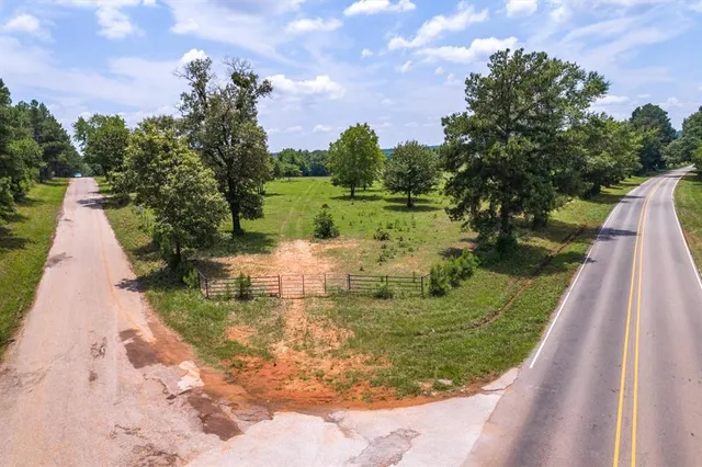 a view of a lake with a yard
