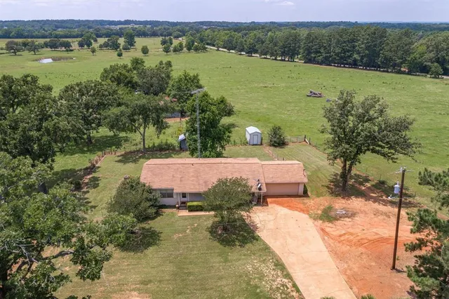 a view of a lake with a yard