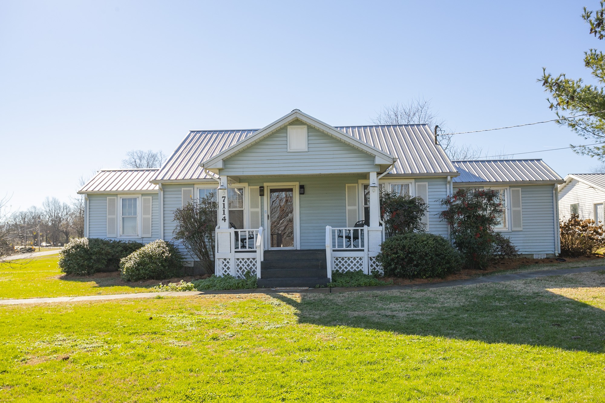 7114 Deer Ridge Road Fairview, TN 37062 - Photo 2 of 55 a front view of a house with garden