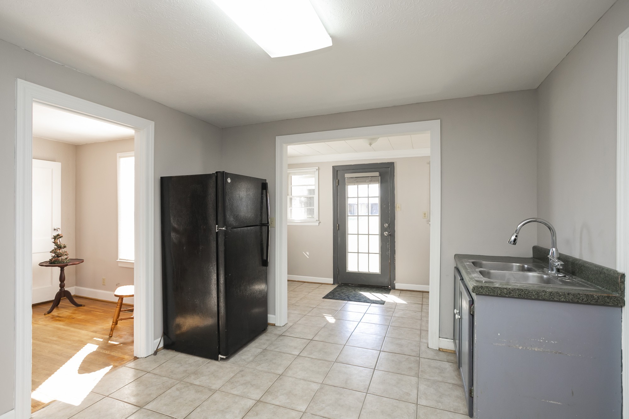 7114 Deer Ridge Road Fairview, TN 37062 - Photo 30 of 55 a kitchen with a refrigerator and a sink