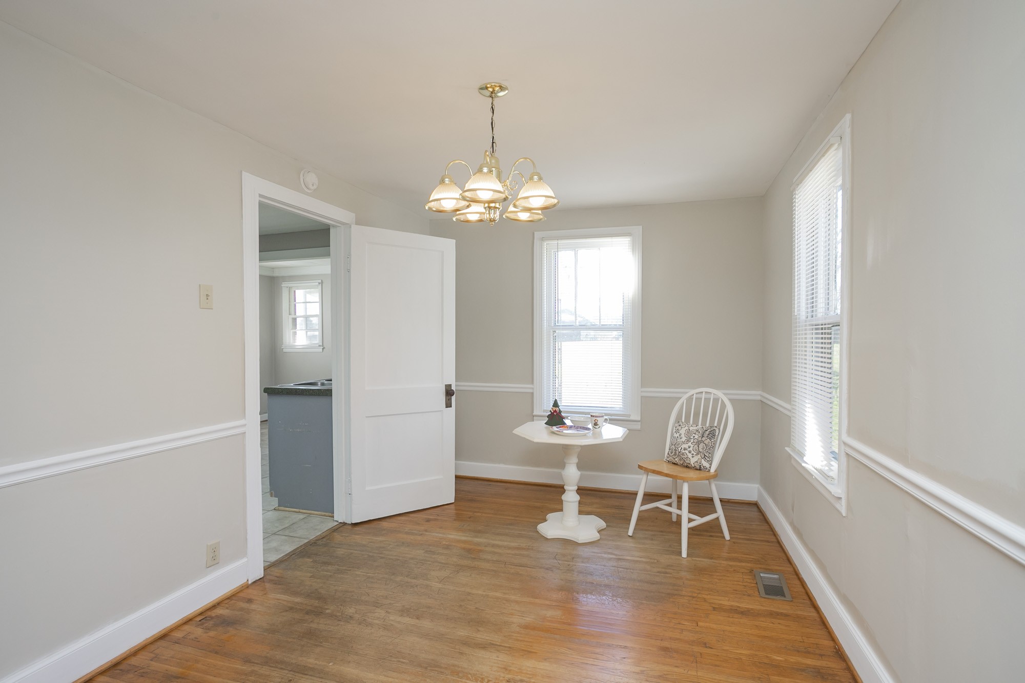 7114 Deer Ridge Road Fairview, TN 37062 - Photo 31 of 55 a view of a room with wooden floor lounge chair and windows