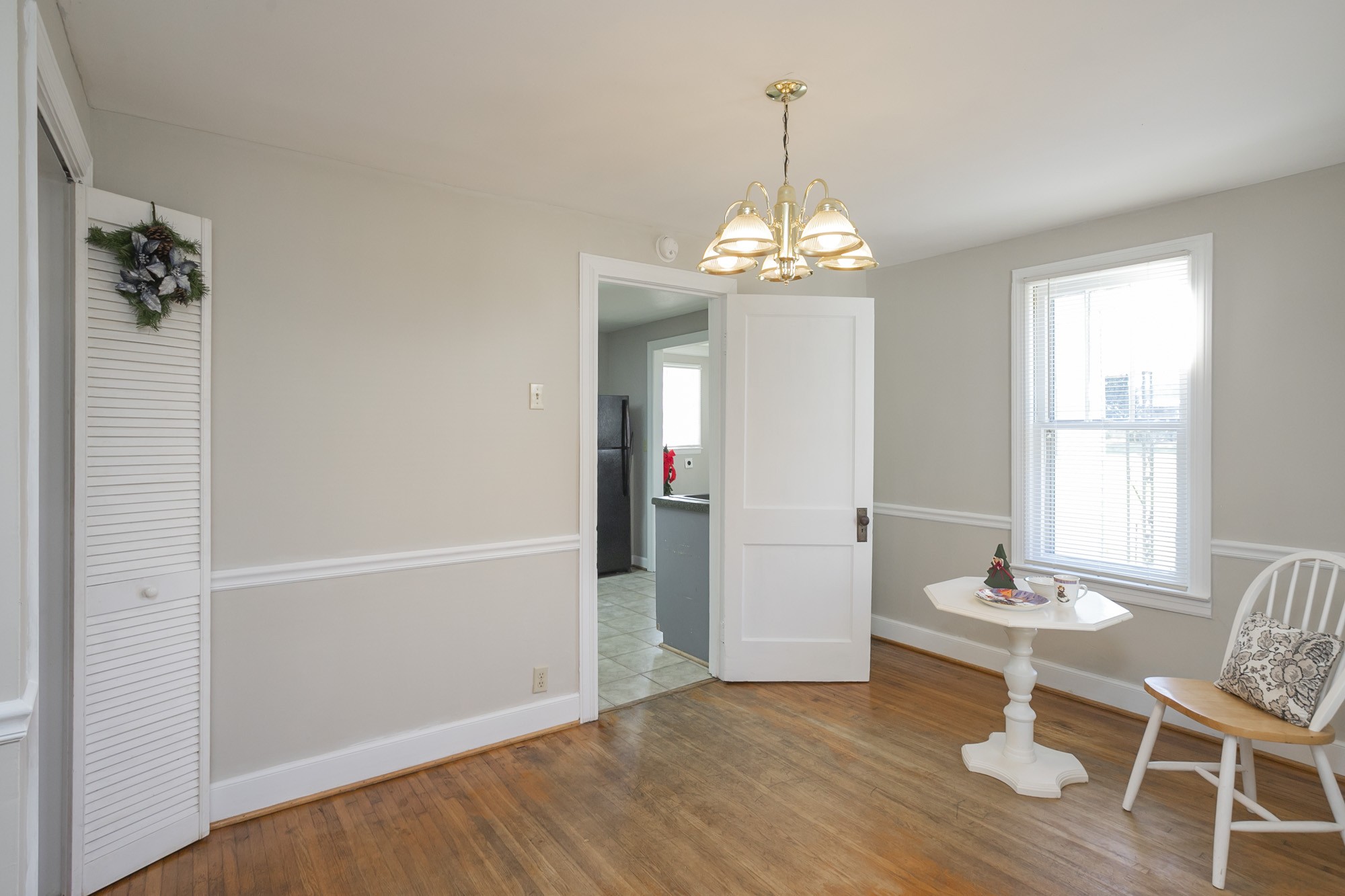 7114 Deer Ridge Road Fairview, TN 37062 - Photo 32 of 55 a view of a room with wooden floor table and chairs