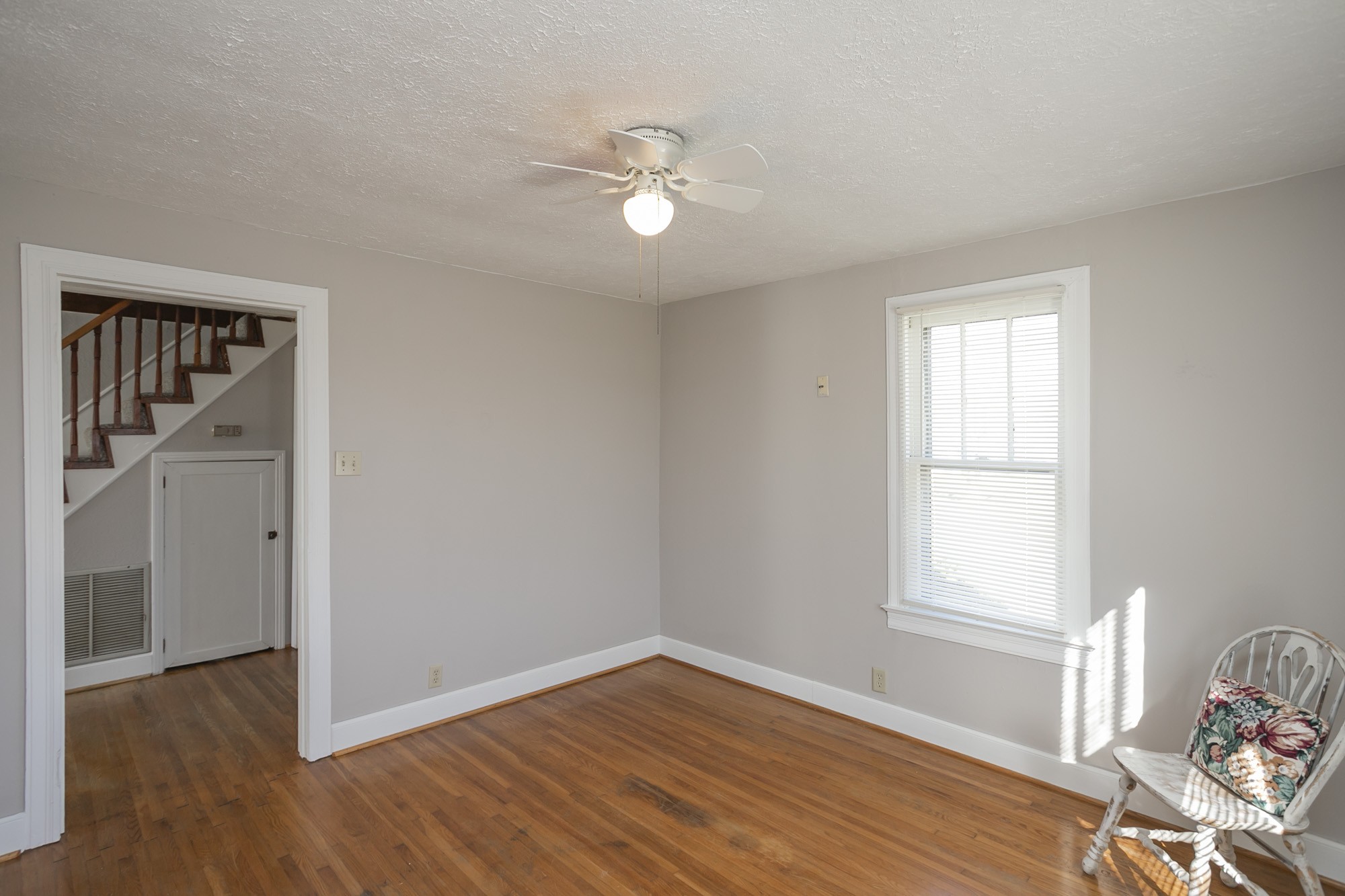 7114 Deer Ridge Road Fairview, TN 37062 - Photo 44 of 55 a view of empty room with wooden floor and fan