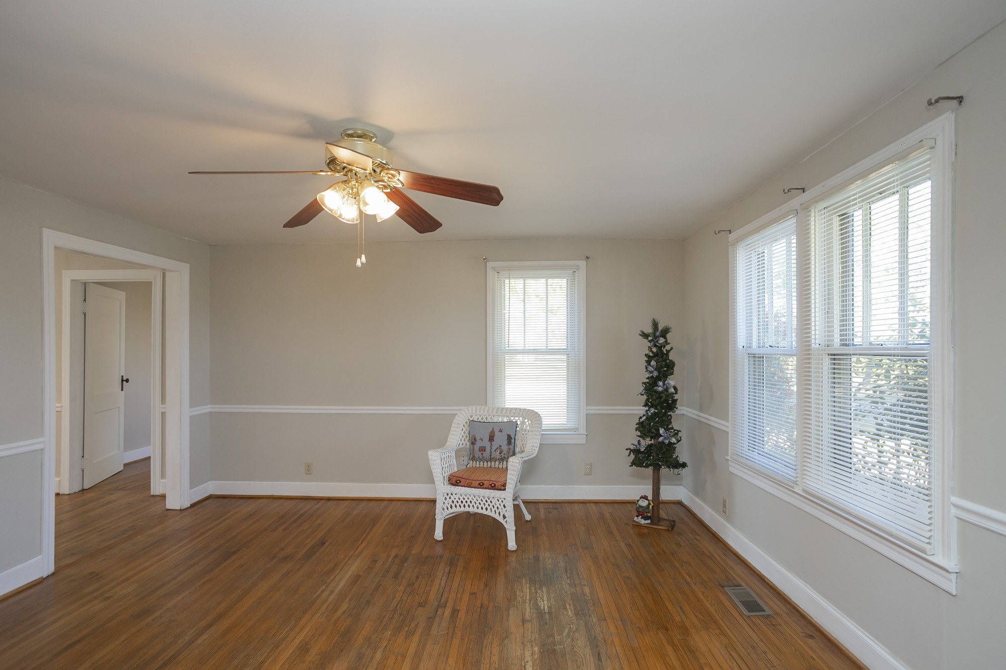 7114 Deer Ridge Road Fairview, TN 37062 - Photo 45 of 55 a living room with furniture and a chandelier