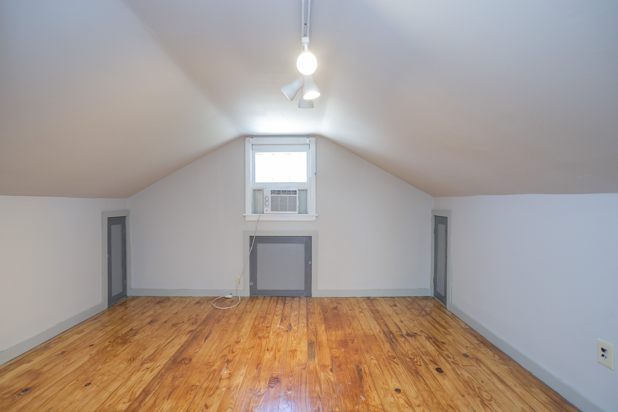 7114 Deer Ridge Road Fairview, TN 37062 - Photo 50 of 55 a view of empty room with wooden floor and fan