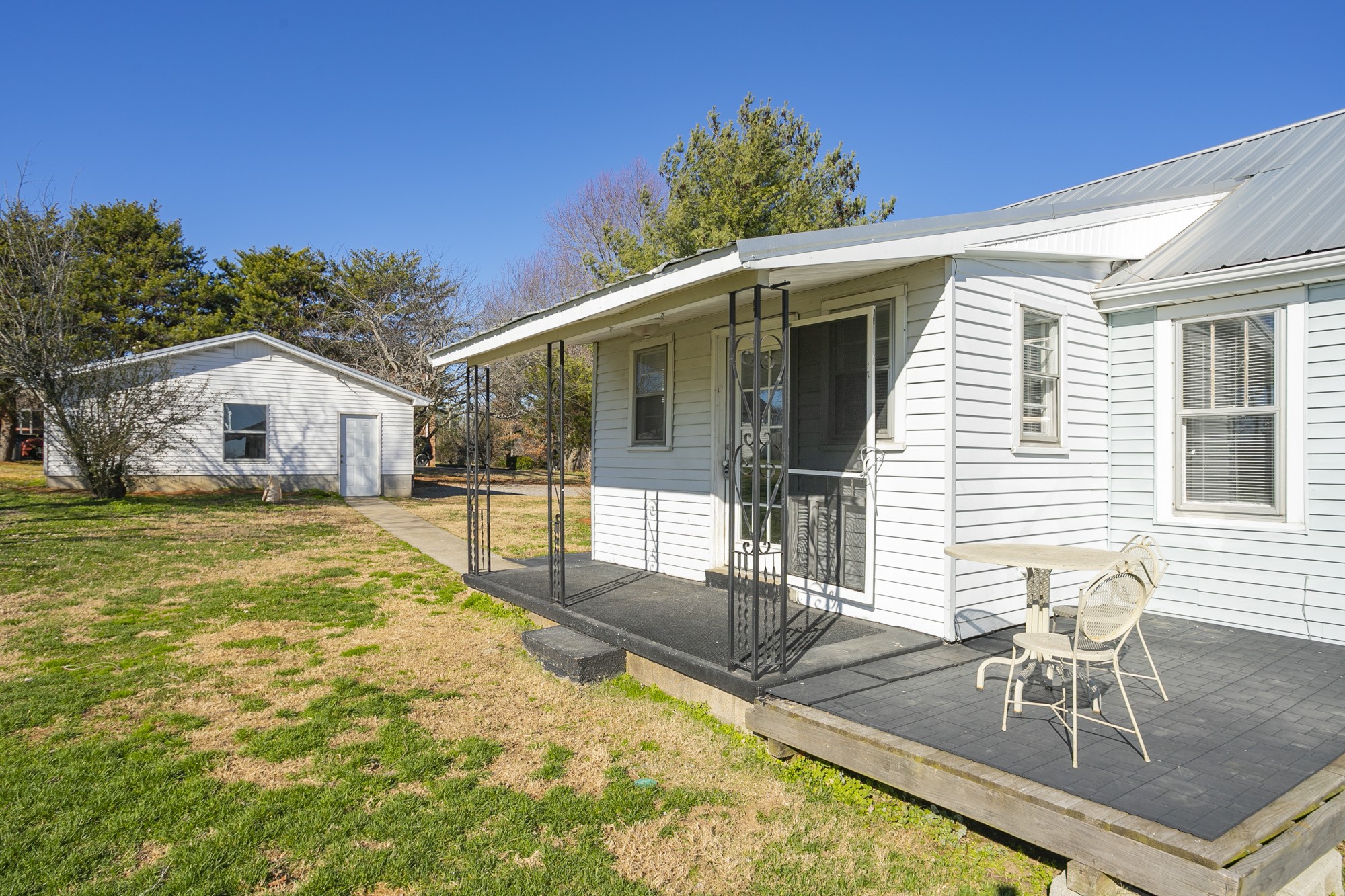 7114 Deer Ridge Road Fairview, TN 37062 - Photo 54 of 55 a view of house with swimming pool and porch with furniture