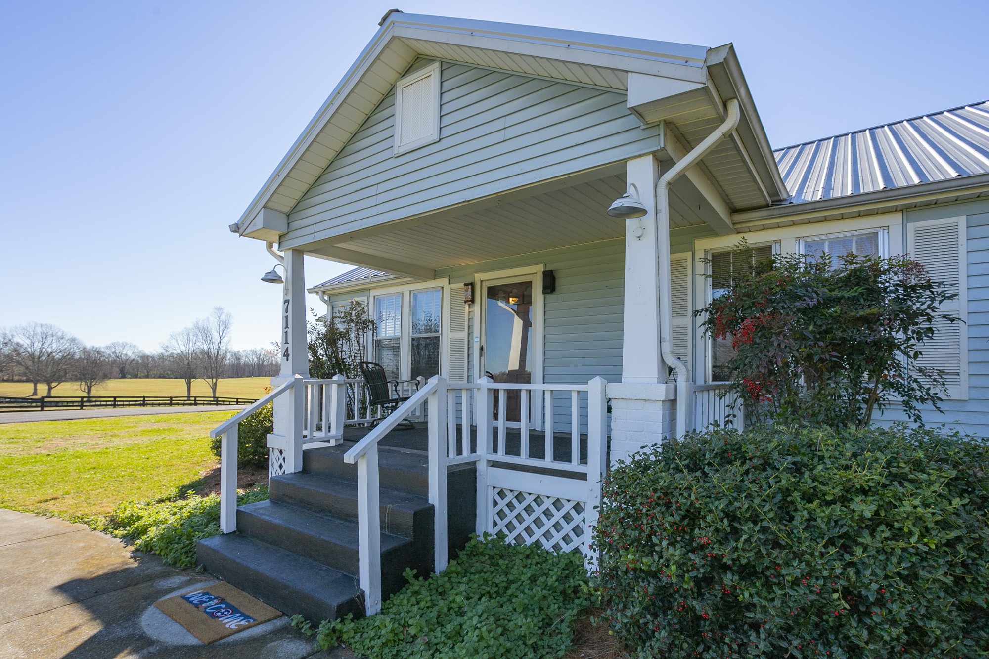 7114 Deer Ridge Road Fairview, TN 37062 - Photo 8 of 55 a view of a house with wooden floor next to a yard