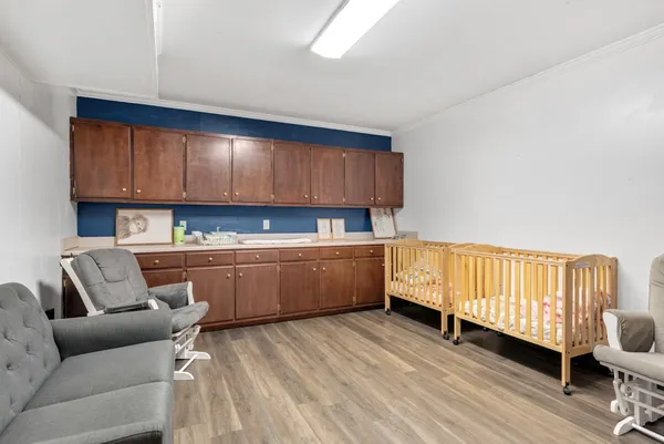 a room with furniture and stairs