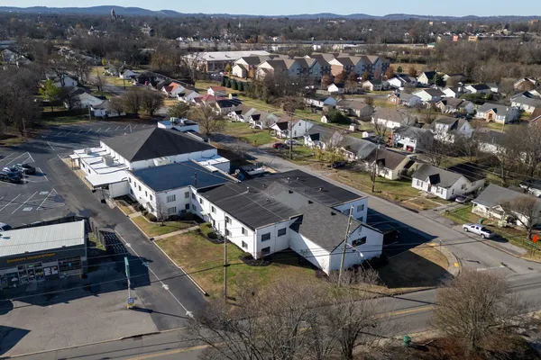 an aerial view of a city with lots of residential buildings