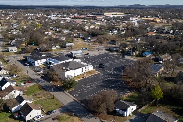a city view with lot of car parked