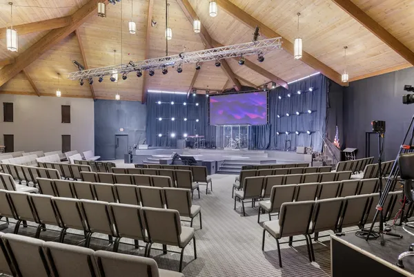 a view of a chairs and tables in the patio